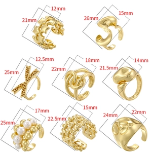 Set of 8 gold geometric irregular rings and star ear clips with specific size dimensions