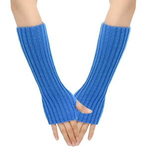Detailed close-up of blue ribbed knit fingerless long gloves for winter arm warming