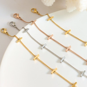Minimalist geometric bar chain bracelet in gold, silver, and rose gold finishes
