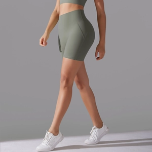 Close-up of olive green high-waisted yoga shorts with seamless design for fitness
