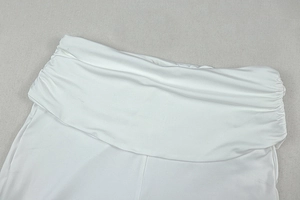 Detail of white waistline with gathered pleats on casual knit halter pants set