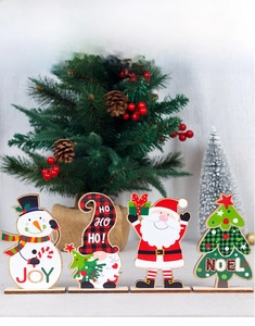 Set of four wooden Christmas figurines including Santa and Snowman with stable base