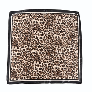 Satin leopard print square silk scarf with black border and white lining, centered flat lay