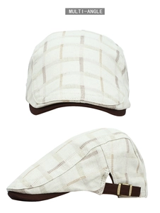 Detail of beige plaid ivy cap with brown brim and vintage adjustable metal buckle
