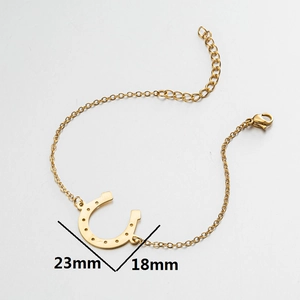 Minimalist gold horseshoe pendant bracelet with 23mm by 18mm dimension details
