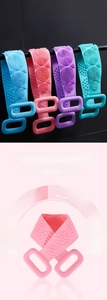 Silicone back scrubber detail showing dual-sided massage texture and sturdy handles
