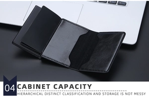 Business style black leather RFID wallet showing multiple card slots near a laptop