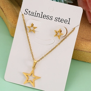 Detailed view of golden stainless steel jewelry set with hollow star pendant and earrings