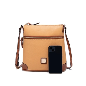Detail view of lychee texture crossbody bag in brown leather showing zipper and dimensions