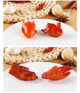 Macro detail of realistic roast chicken and duck food models on a rustic table with spices