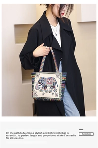 Detailed embroidery of a blue elephant on a durable canvas ethnic style tote bag