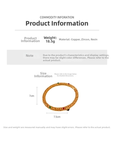 Detail of 24K gold plated bracelet with textured copper, zircon and resin stones