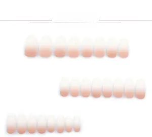 Flat lay of 24pcs pink to white gradient French almond press-on nails set display
