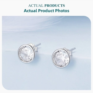 Close-up of sparkling S925 sterling silver stud earrings with clear round zirconia stones