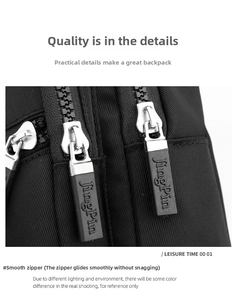 Detailed close-up of the smooth silver zipper and durable black oxford fabric