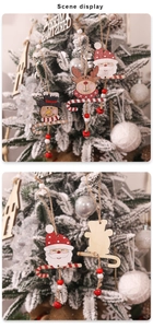 Detail of wooden Christmas ornaments featuring Santa, reindeer and bells on a tree