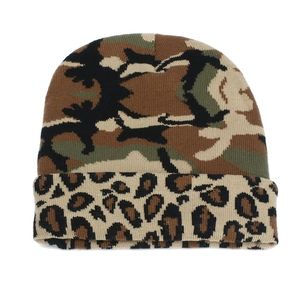 Close-up of knit beanie featuring camouflage pattern with leopard print cuff detail