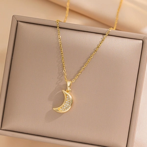 18K gold plated stainless steel moon pendant necklace with crystals in a jewelry box