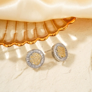 Elegant geometric round stud earrings with gold flower pattern and cubic zirconia inlay