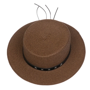 Flat top woven straw hat in coffee brown with black leather band and silver star studs