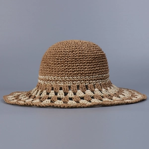 Detail of color-block crochet sun hat with wavy brim and hollow weave patterns