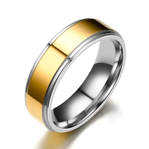 Macro detail of 4mm minimalist two-tone gold and silver stainless steel polished ring