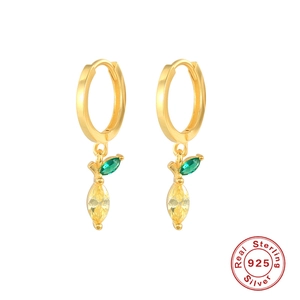 Detail view of gold S925 sterling silver hoop earrings with tropical fruit and leaf charms