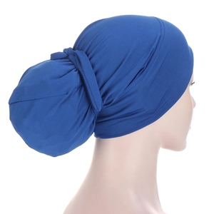 Detail view of navy blue chemo headscarf with high-elastic knit texture on mannequin