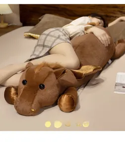 Detail of soft brown plush horse pillow shown in a cozy bedroom sleep setting