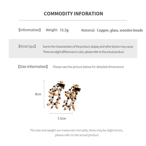 Detailed spec sheet showing material info and dimensions of beaded tassel earrings
