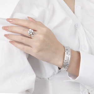 Elegant S925 sterling silver flower ring and textured cuff bracelet set for women