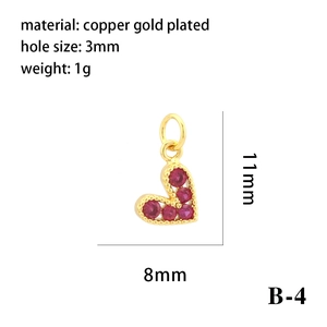 Detailed view of 18K gold plated heart pendant with red zircon and technical dimensions