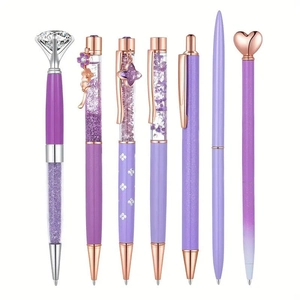 Set of luxury purple ballpoint pens with crown, floating sand, and crystal accents