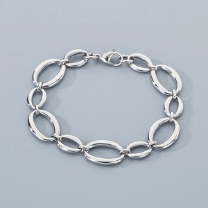Polished silver stainless steel oval link chain bracelet with secure lobster clasp detail