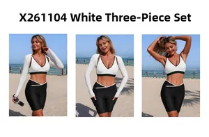 Three-piece bikini set with white long-sleeve cover-up and black high-waisted shorts