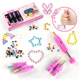 Kids DIY hair diamond stamper kit with pink applicator pen and colorful sparkling gems