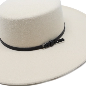 Flat top wide brim wool felt hat in beige with black leather strap and metal buckle