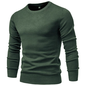 Detail of the crew neck and thick knit texture on a dark green slim fit men's sweater