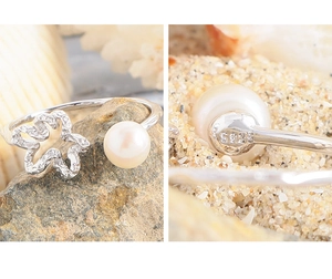 Detailed macro shot of S925 hallmark engraving on sterling silver pearl flower ring