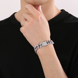 Close-up of hip hop silver iced out cuban link bracelet with sparkling rhinestones