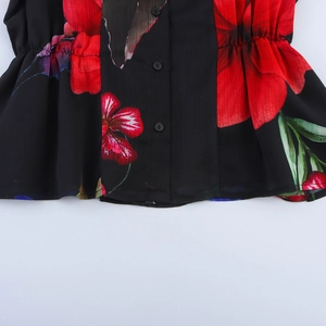 Women's elegant black chiffon short sleeve blouse with red floral print and cinched waist