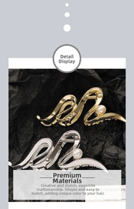Detail of elegant wave metal hair claws with pearl accent in gold and silver finish
