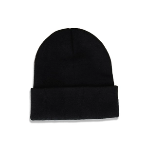 Close-up of black knitted beanie showing detailed weave texture and wide folded brim