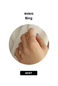 Detailed view of minimalist rose gold stackable rings with polished finish for women