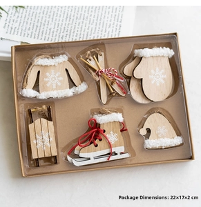 Detail of wooden Christmas ornaments set featuring mini sleds, skates and gloves