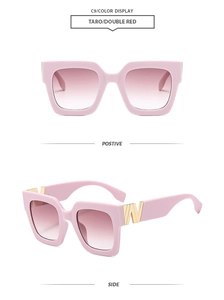 Detail view of square taro purple sunglasses with red gradient lenses and golden W logo