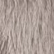 Macro della texture in ecopelliccia con morbide fibre sintetiche beige e marrone chiaro