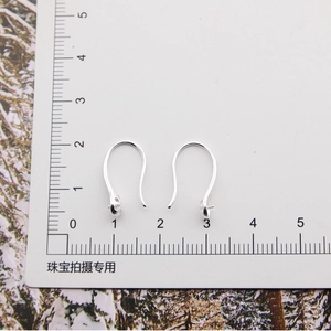 Detail view of S925 sterling silver earring hooks with scale ruler for DIY jewelry making