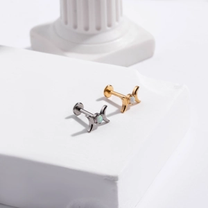Titanium crescent moon labret earrings with opal stones in silver and gold tones