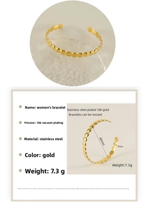 Detailed view of 6mm 18K gold plated stainless steel cuff bangle with size specs